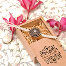 Load image into Gallery viewer, Taru(White)-Handcrafted Wooden & Mother-of-Pearl Rakhis with Silk yarn braiding – A Celebration of Design and Tradition