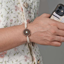 Load image into Gallery viewer, Taru(Emerald)-Handcrafted Wooden & Mother-of-Pearl Rakhis with Silk yarn braiding – A Celebration of Design and Tradition