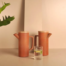 Load image into Gallery viewer, Set of 2 - Minimal, Sleek & contemporary HandmadeTerracotta earthen Jug/Clay Pitcher for your Home/Office/Dinning and Table top - Double fired from Earthen collection - 1000ml/1 litre with Wooden lid-Terracotta-Claymango.com