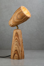 Load image into Gallery viewer, Wooden lamp with a textured design on a gray background
