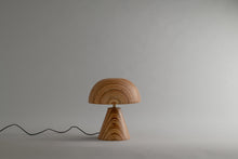 Load image into Gallery viewer, Wooden lamp with a wavy cable on a plain background
