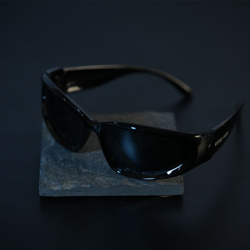 Escape Oval Unisex Sunglasses: Black with Black Tint